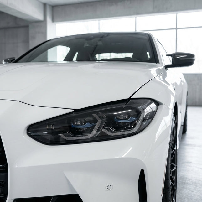 MOSFA light smoke headlight tint film on BMW with subtle dark tinted protection