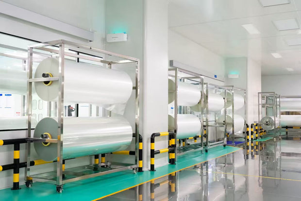 Vinyl wrap and PPF raw material rolls in factory storage - bulk film supply