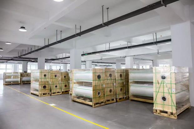 Vinyl wrap and PPF raw material rolls in factory storage - bulk film supply